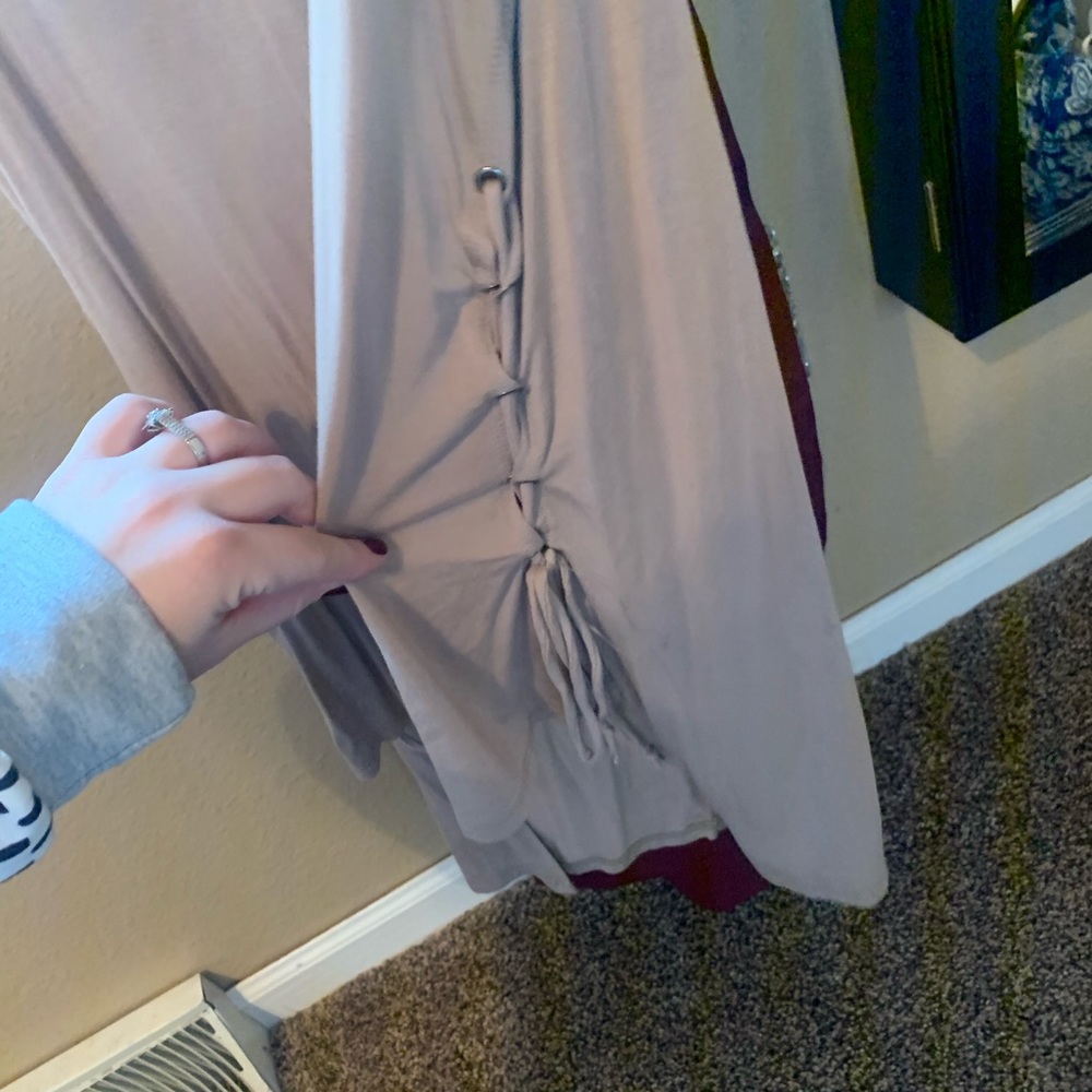 Tan high low tank top with lace up detail